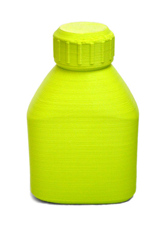 Objects printed by 3d printer Isolated on white background. Bright colorful object. Bottle of green color. Automatic three dimensional 3d printer performs plastic modeling in laboratory.の写真素材