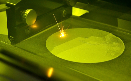 Laser sintering machine for metal. Metal is sintered under the action of laser into desired shape in...