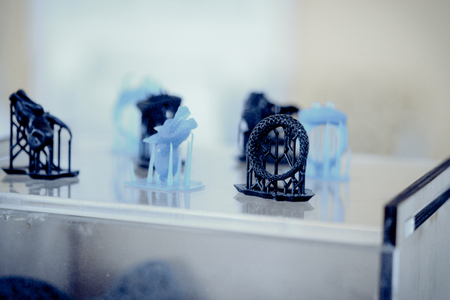 Objects photopolymer printed on a 3d printer. Stereolithography 3D printer, technology of liquid photopolymerization under UV lightの写真素材