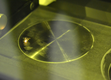 Laser sintering machine for metal. Metal is sintered under the action of laser into desired shape in...