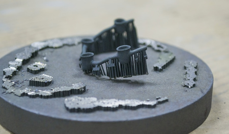 Object denture body printed on a laser sintering machine on the work diskの写真素材