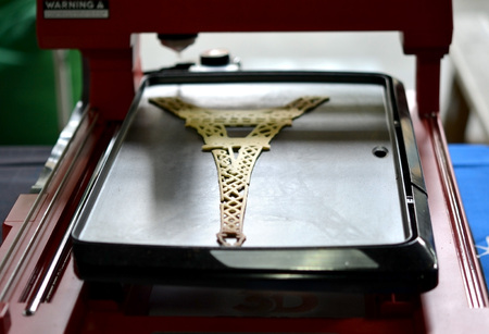 3d printer that printing a liquid dough. 3D printer printing pancakes with liquid dough different shapes close-up. Modern additive technologies 4.0 industrial revolutionの写真素材