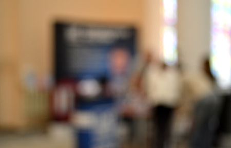 Many people Inside the building. Blurred background. Bokeh. Copy spase, space for text.の写真素材