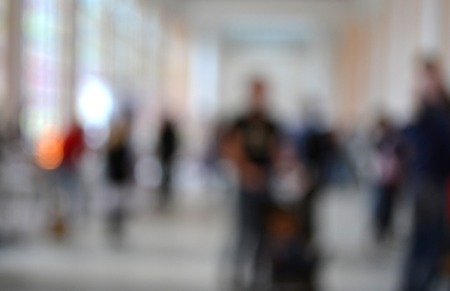 Many people Inside the building. Blurred background. Bokeh. Copy spase, space for text.の写真素材