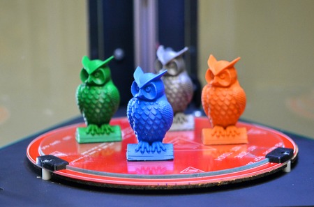 Objects are inside the three-axis 3d printer on which they were created close-up. Progressive modern additive technologies 4.0 industrial revolutionの写真素材