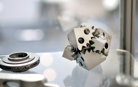 Object printed on metal 3d printer. A model created in a laser sintering machine close-up. DMLS,...