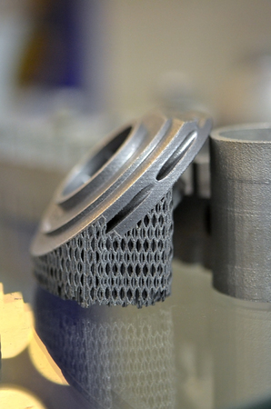 Object printed on metal 3d printer. A model created in a laser sintering machine close-up. DMLS,...