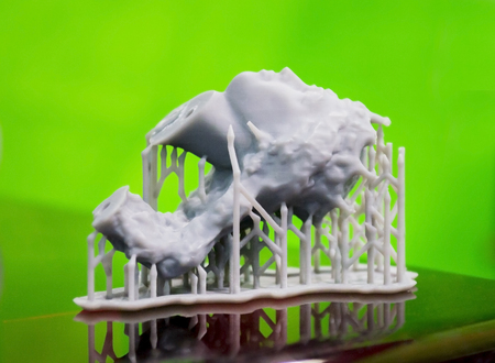 Objects photopolymer printed on a 3d printer. Stereolithography 3D printer, technology of liquid photopolymerization under UV light. Progressive modern additive technology 3D printing.の写真素材