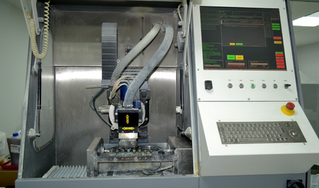 Milling machine. Milling machine that mills titanium Dental implants. Overall plan