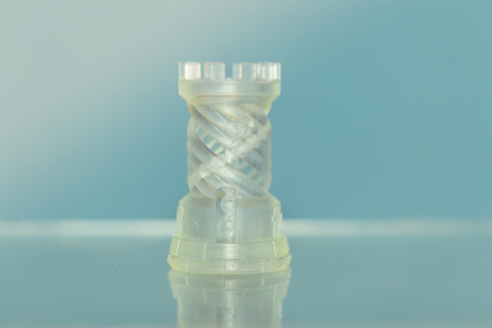 One object photopolymer printed on 3d printer. Stereolithography 3D printer, technology liquid photopolymerization UV light. Progressive modern additive technology. Concept 4.0 industrial revolutionの写真素材