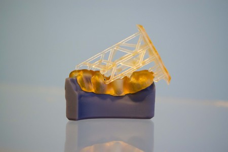 Human jaw printed on 3d printer of photopolymer. Stereolithography 3D printer of liquid photopolymerization under UV light. Progressive additive technology. Concept of 4.0 industrial revolutionの写真素材