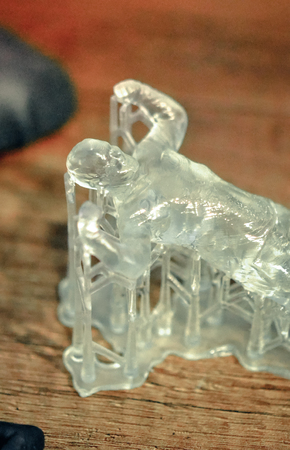 Objects photopolymer printed on a 3d printer. Stereolithography 3D printer, technology of liquid...