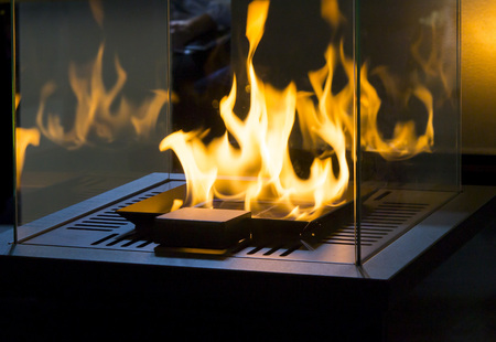 Modern bio fireplot fireplace on ethanol gas. Smart ecological alternative technologies....