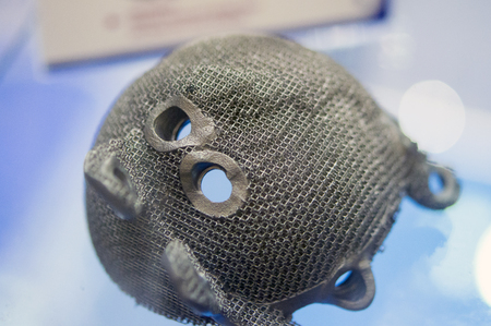 Object printed on metal 3d printer. A model created in a laser sintering machine close-up. DMLS,...
