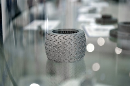 Selective Laser Melting. Object printed on metal 3d printer. Model created in laser sintering machine. DMLS, SLM, SLS technology. Concept of 4.0 industrial revolution. Progressive additive technology.の写真素材