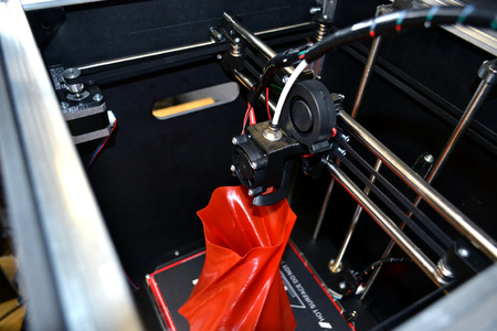 3D printer working close up. Automatic three dimensional 3d printer performs plastic. Modern 3D...