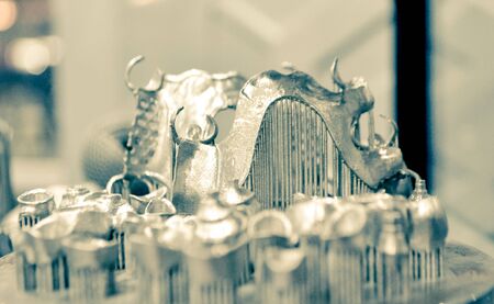 Object printed on metal 3d printer close-up. Object printed in laser sintering machine. Modern 3D printer printing from metal powder. Concept progressive additive DMLS, SLM, SLS 3d printing technologyの写真素材