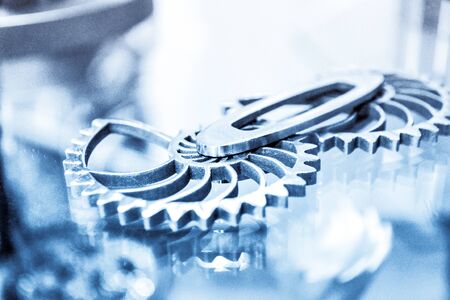 Object printed on metal 3d printer close-up. Object printed in laser sintering machine. Modern 3D...