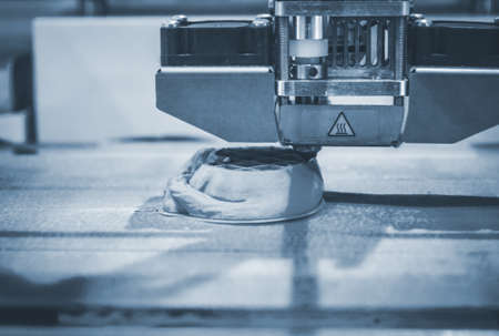 Objects printed by 3d printer. Automatic three dimensional 3d printer performs