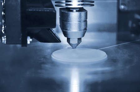 3D printer print objects on surface close-up. Modern 3D printing technology