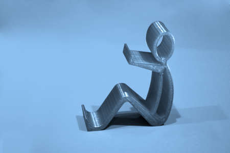 Abstract isolated object of a green color printed on a 3d printer on surfaceの写真素材