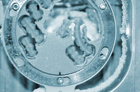 Dental milling machine carving out shape of human teeth