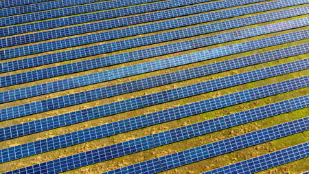 Aerial drone view flight over solar power station panels.の写真素材