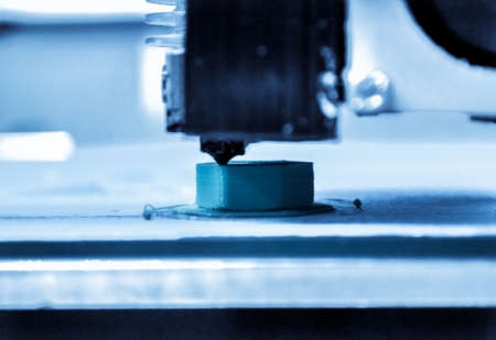3D printer working. Action of head 3D printer. 3D printing process.の写真素材