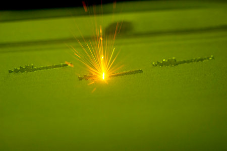 3D printer prints object from metal powder. Metal is sintered under laserの写真素材