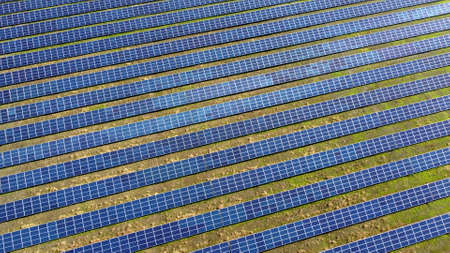 Aerial drone view flight over solar power station panels.の写真素材