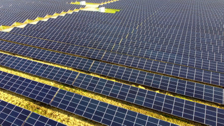 Aerial drone view flight over solar power station panels.の写真素材