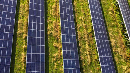 Aerial drone view flight over solar power station panels.の写真素材