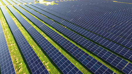 Aerial drone view flight over solar power station panels.の写真素材