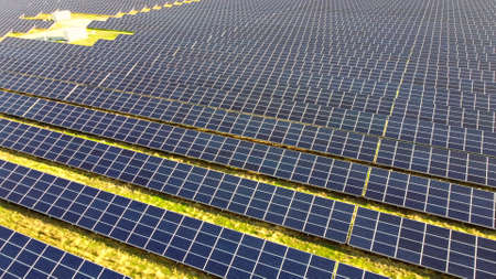 Aerial drone view flight over solar power station panels.の写真素材