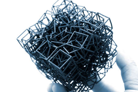 Person holding object printed on 3D printer from polyamide powderの写真素材