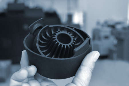 Person holding object printed on professional 3D printer.の写真素材