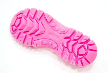 3D printer printed pink shoe soles in natural size isolated on white backgroundの写真素材