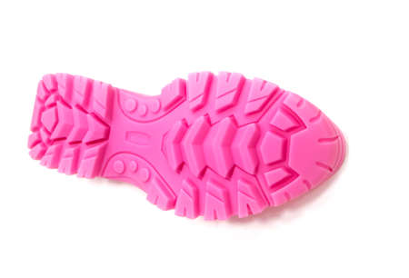 3D printer printed pink shoe soles in natural size isolated on white backgroundの写真素材