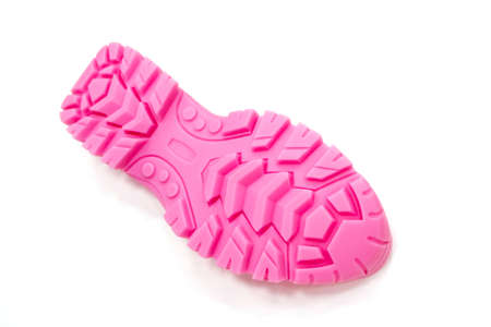 3D printer printed pink shoe soles in natural size isolated on white backgroundの写真素材