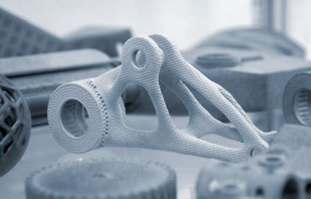 Gray object printed on powder industrial 3D printer. Three-dimensionalの写真素材