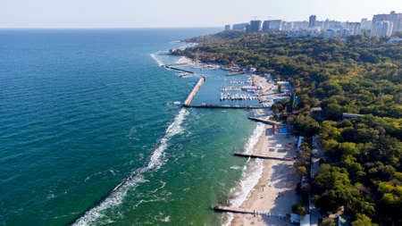 People Walking and Relaxing on Sandy Beach . Aerial Drone View Over Public Beachの写真素材