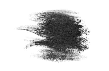 Black brush strokes oil paints on white paper. Isolated on white background.の写真素材