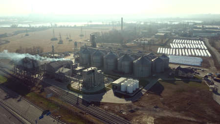 Landscape Grain Elevator. Aerial Drone View. Flight View Over Metal Round Silosの写真素材