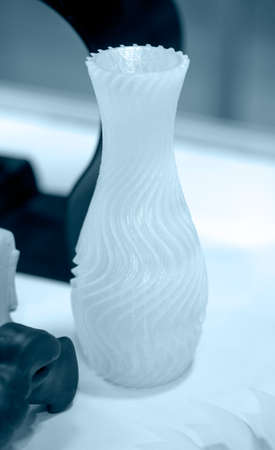 White object 3D printed from plastic close-up. New 3D printing technology.の写真素材