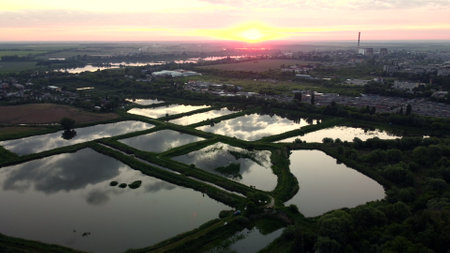 Aerial drone view flight over fish farming rates lakes. Fish Farming.の写真素材