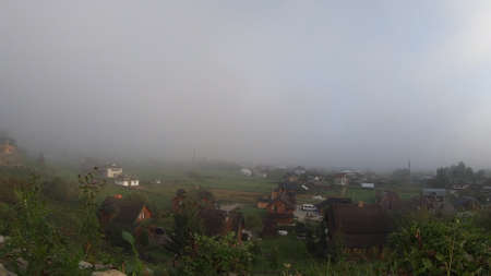 Morning fog dissipates in the mountainsの写真素材