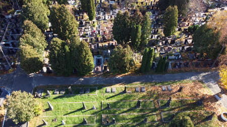 Arial drone view flight over old cemetery with tombstones, gravestones, arrowsの写真素材