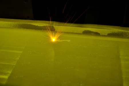 3D printer prints object from metal powder. Metal is sintered under laserの写真素材