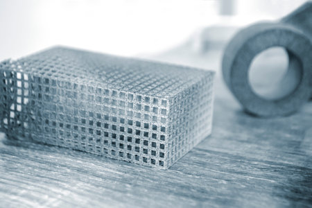 Gray abstract model object printed on 3d printer from powder close-upの写真素材