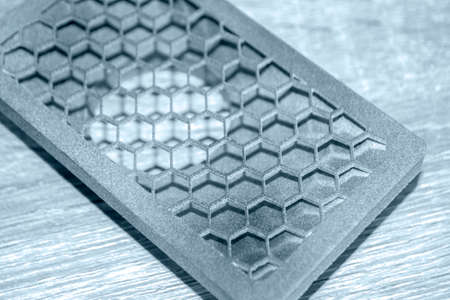 Gray abstract model printed on 3d printer from powder on background.の写真素材